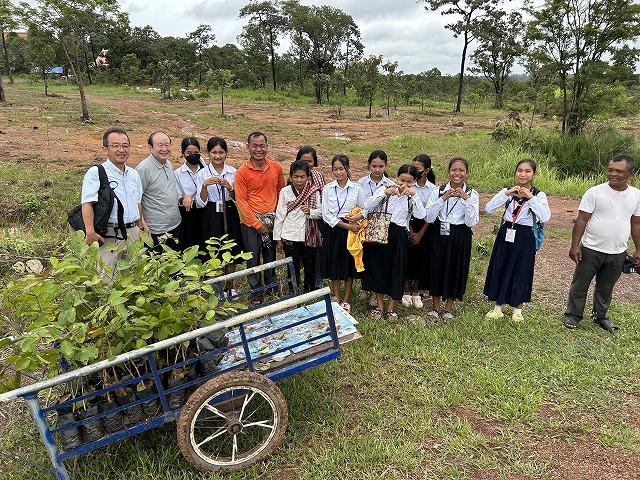 With tree planting participants